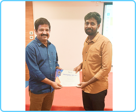 Gunalan receiving the Mastering the Art of Coaching certificate